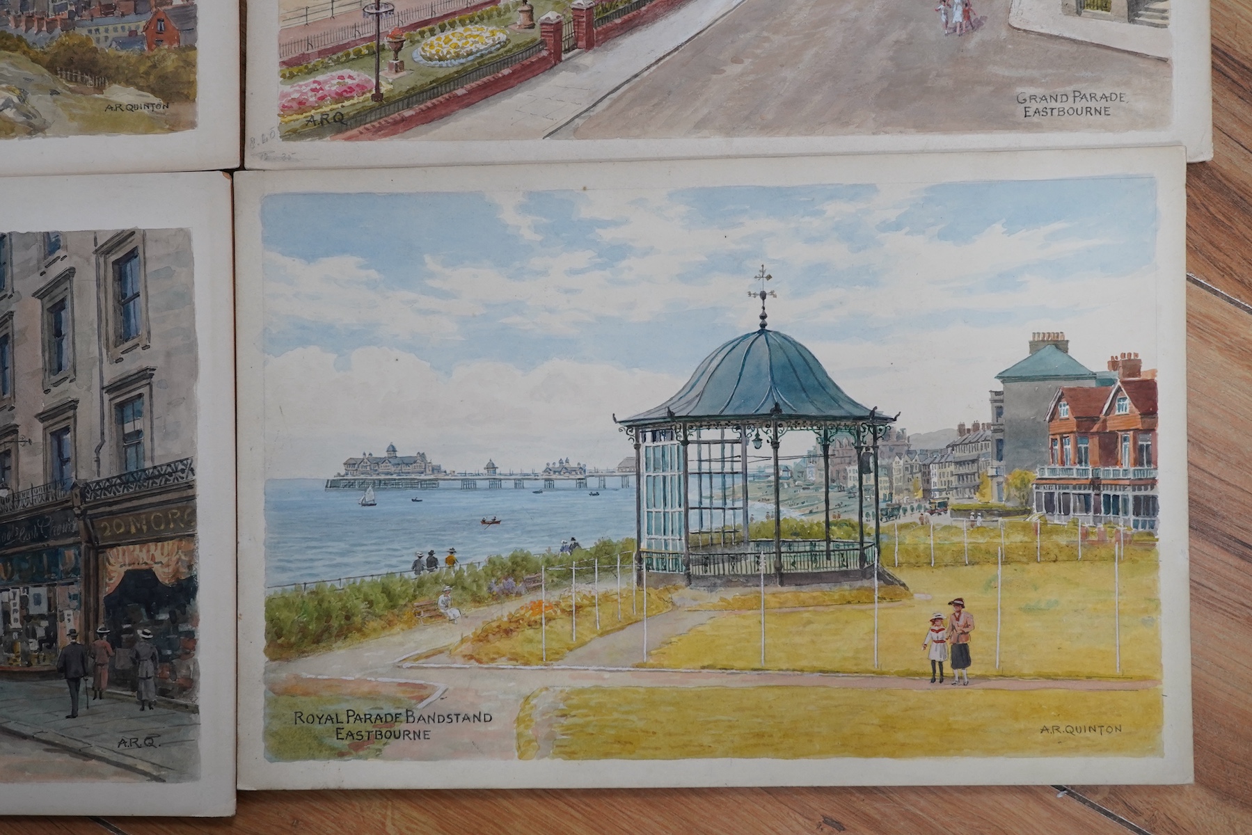 Alfred Robert Quinton (1853-1934), set of four original watercolours for postcard designs, Sussex coastal views comprising: Royal Parade bandstand, Eastbourne, Grand Parade, Eastbourne, Hastings from the castle and Rober